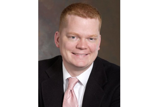 Professor posing for camera