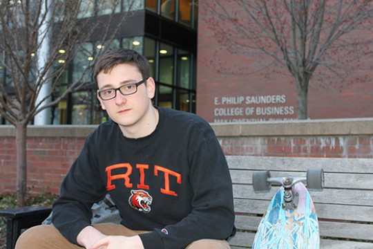 Portrait of Nathan Raw outside of Saunders college of business.