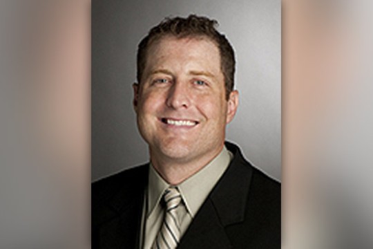 Professor posing for camera