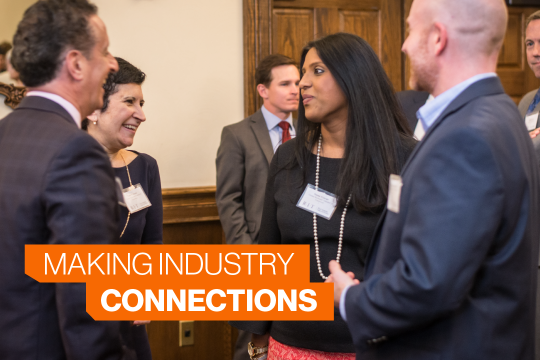 Professionals gather to converse at Saunders.