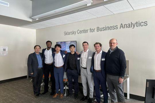 Group photo under Skylarksy Center sign