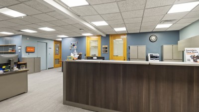 a reception area with a desk.