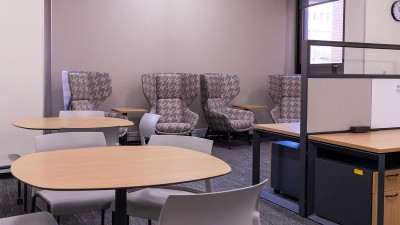 meeting space with high backed chairs.