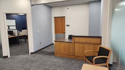 a reception area with a desk.