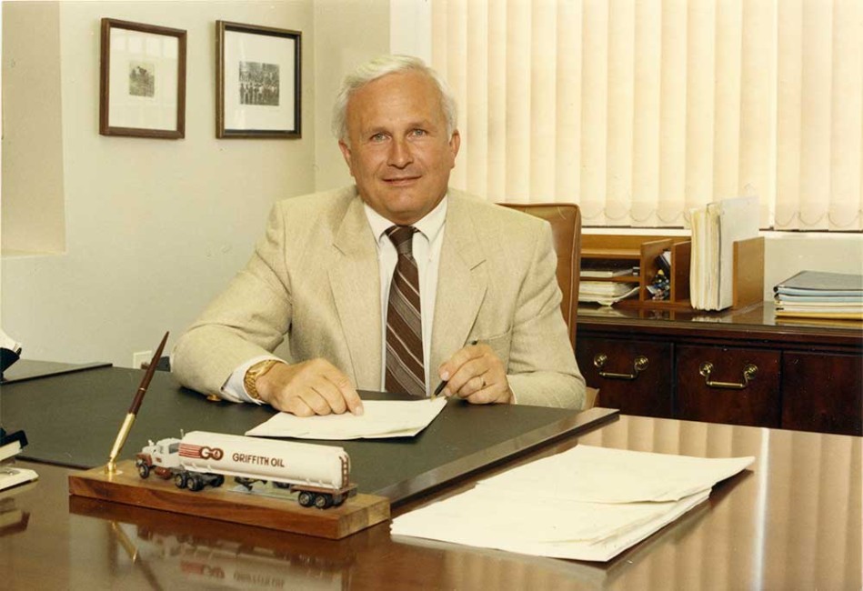 Phil Saunders sitting at a desk