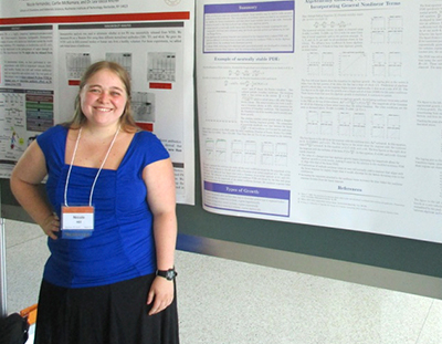 Nicole Hill in front of her research poster