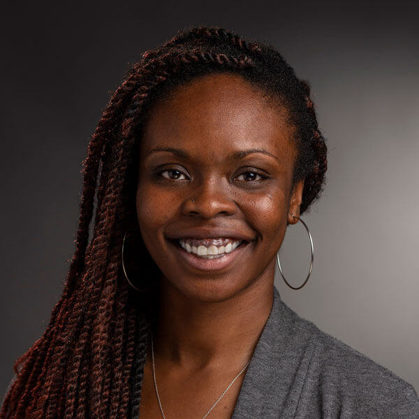 Headshot of Mercy Gbenjo.