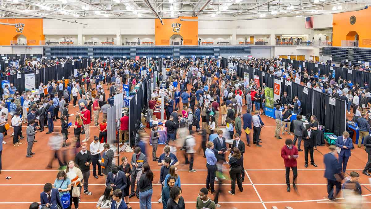 wide view of crowds of students attending a career fair.