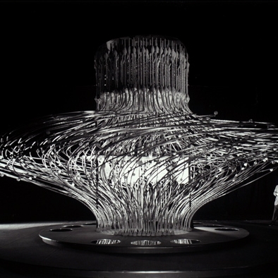 Photograph. Burtin with Chromosome: Genes in Action exhibit, 1960. Photograph by Ezra Stoller © Esto.