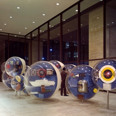 Color Photograph. Front view of different “product spheres” for The World of Brunswick exhibit. Designed for the Brunswick Corporation, Chicago, 1965. Photographer: Ezra Stoller © Esto.