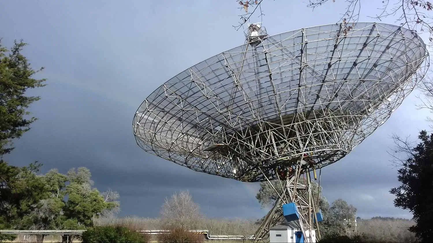 A large satellite in a field.