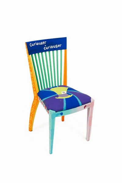 Its multicolored with the Cheshire Cat on the back 