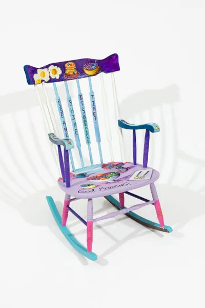 Lots of breakfast foods, fruit bowl in the center.