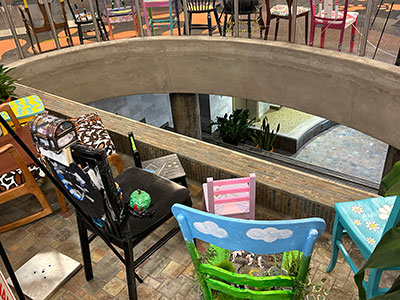 all of the chairs on display together