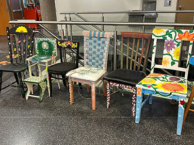 all of the chairs on display together