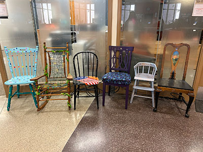 all of the chairs on display together