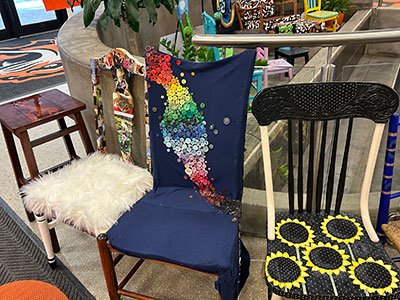 all of the chairs on display together