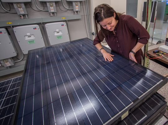research working on solar panel prototype