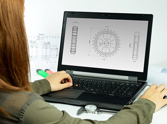 woman at computer working on CAD project