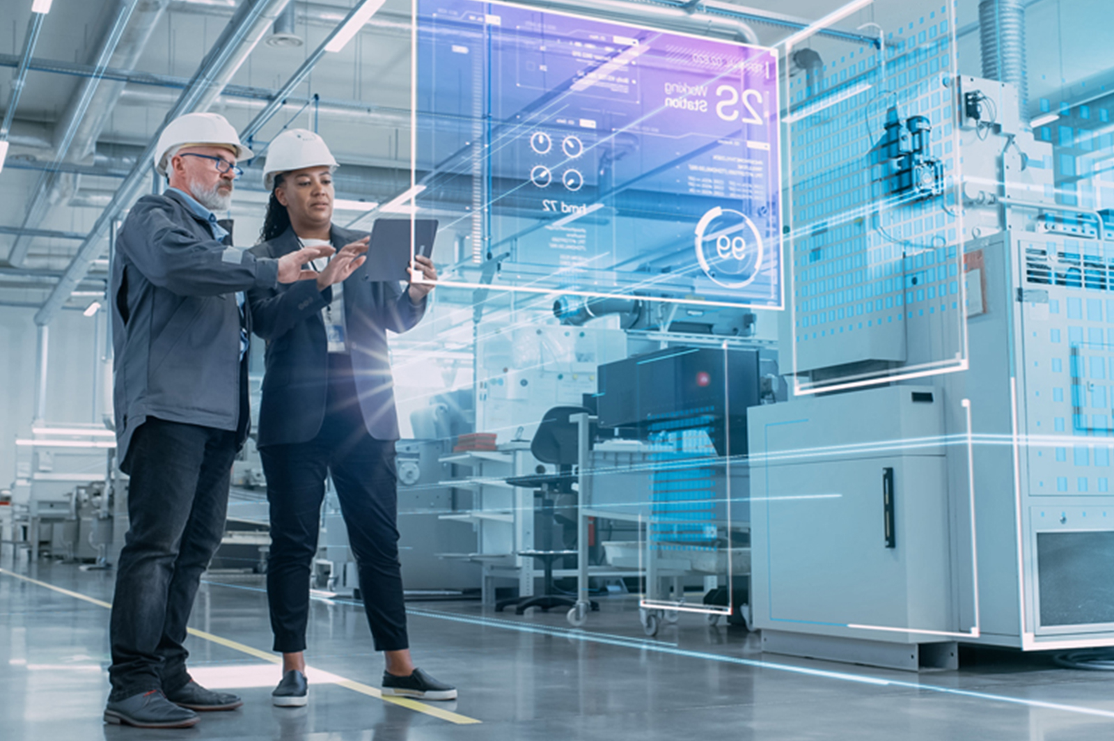 man and woman wearing hard hats in futuristic manufacturing floor