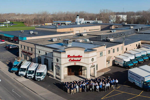 aerial view of Rochester Colonial's employees standing outside of their building