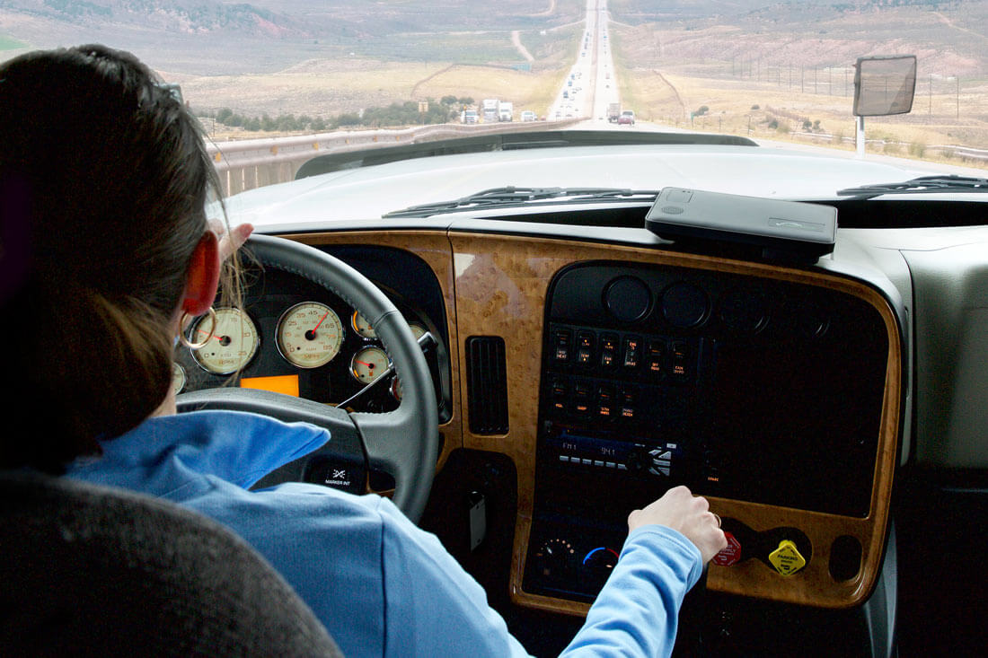 A person driving a vehicle equipped with a Vnomics device