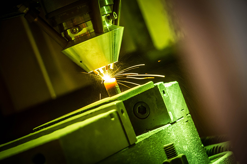 Additive manufacturing equipment in operation