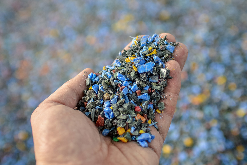Plastic pieces in a person's hand