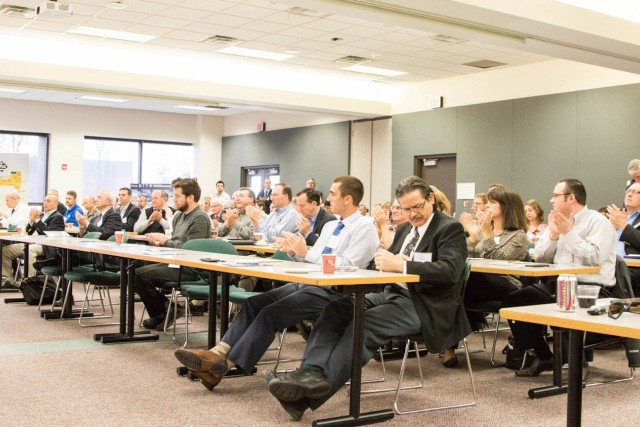 CIMS conference audience clapping.
