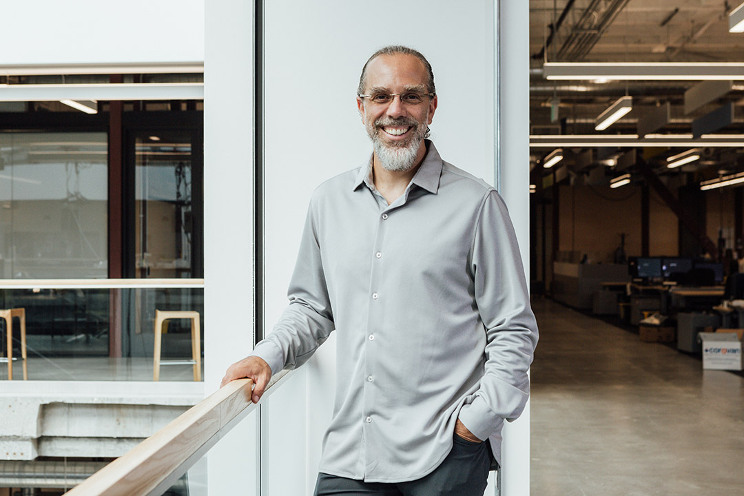 Man smiling and standing