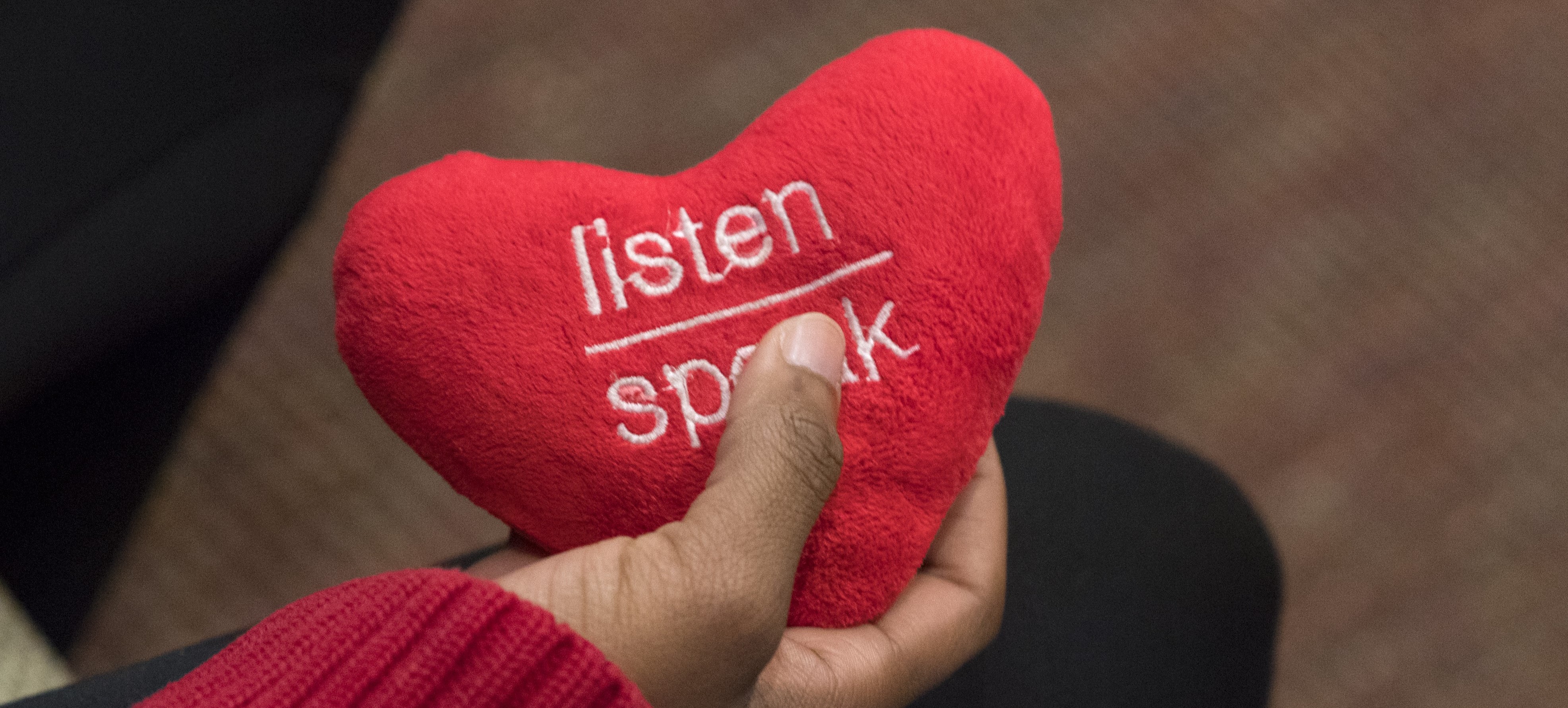 plush heart with the words listen speak 