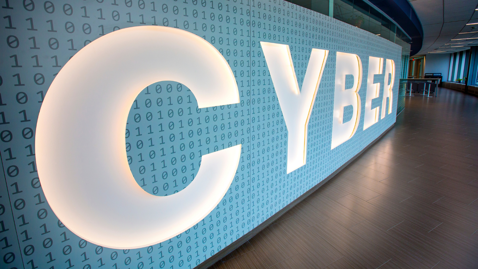 large backlit sign that says 'Cyber'