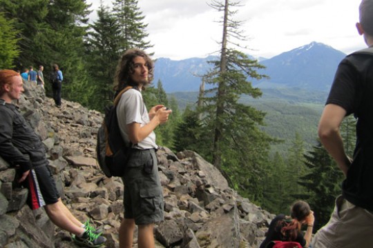 People posing near mountain
