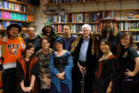 People gathered posing together