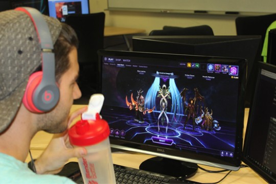 student playing computer game.