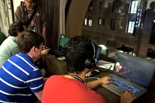 People working on computers at desk