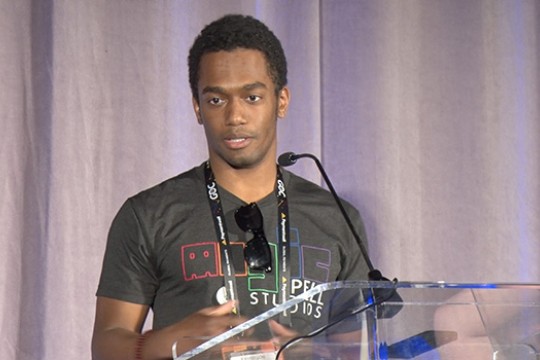 Person speaking at podium at event