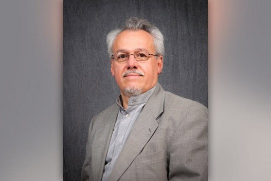 Professor posing for camera