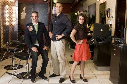 Three Television hosts posing in studio
