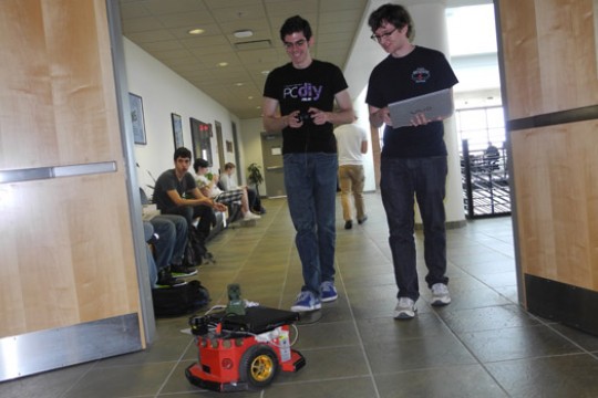 People controlling robot