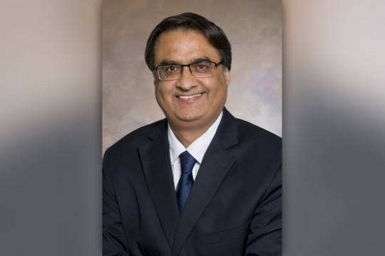 Professor posing for camera