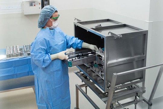 Scientists cleaning equipment