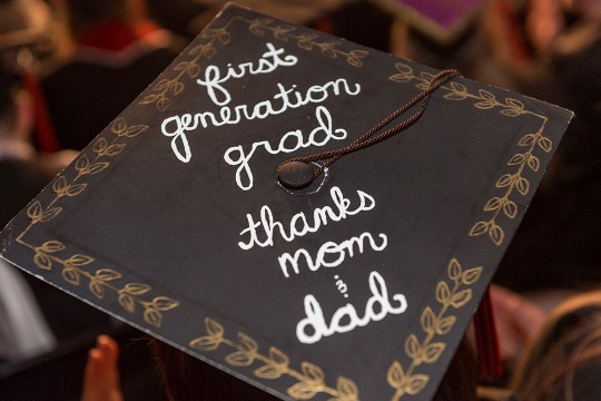 graduation cap decorated to read: first generation grad, thanks mom and dad.