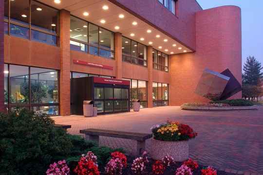 exterior of brick building at dusk.