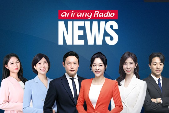 six newscasters stand under a sign reading arirang radio news