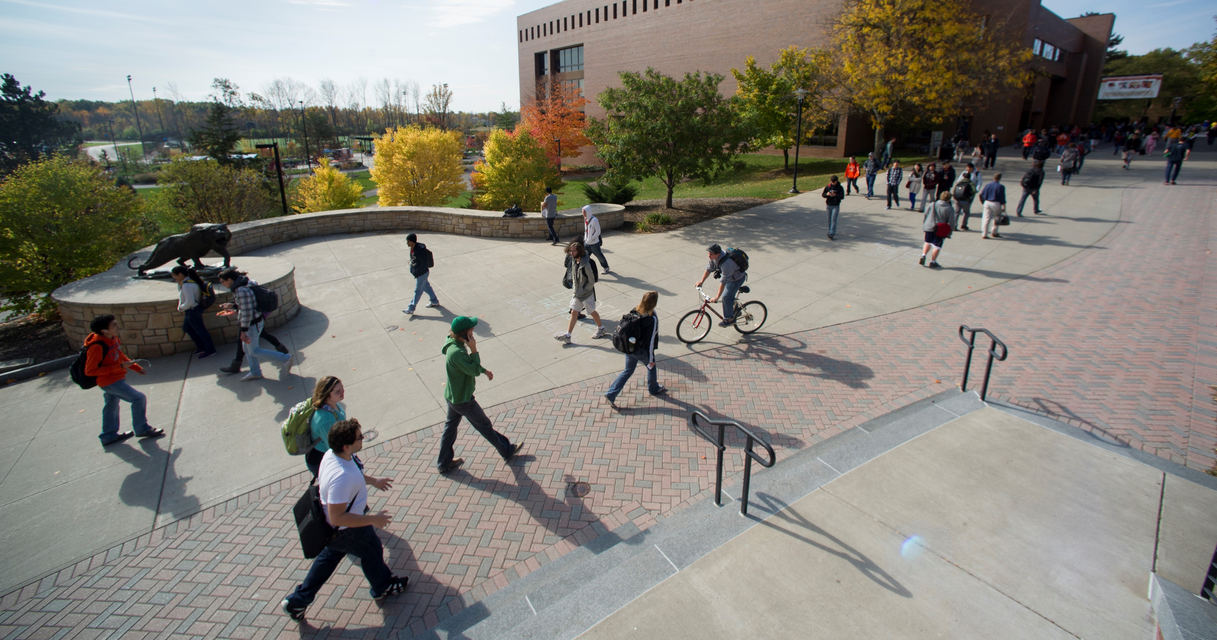 RIT students walking across campus