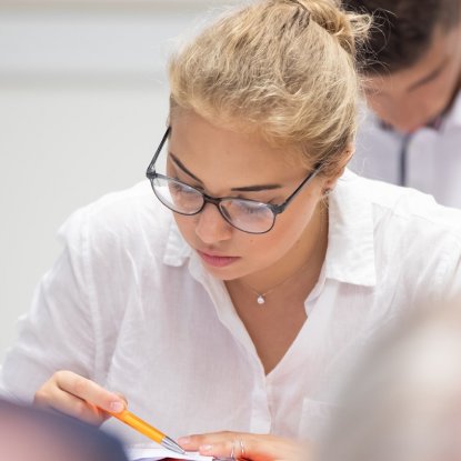 Student working with lab equipment