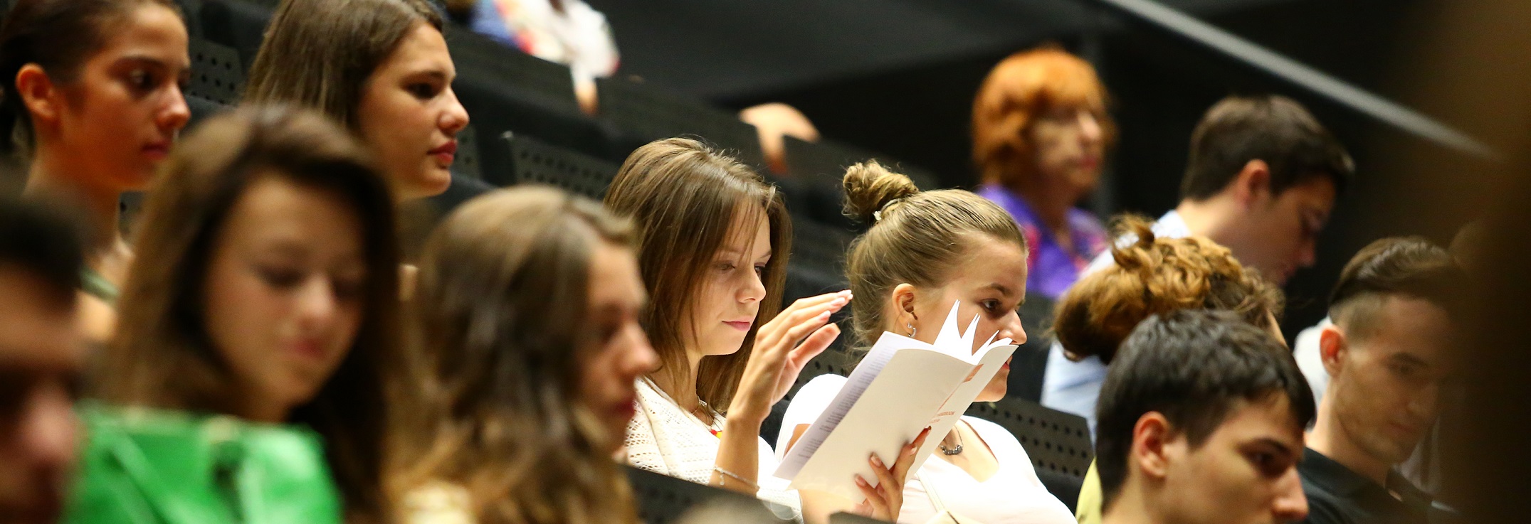 Students at Orientation for GBM banner