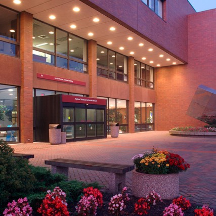 exterior of brick building at dusk.