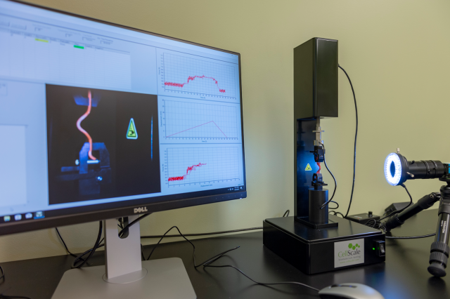 Biomedical device and computer monitor displaying data and graphs
